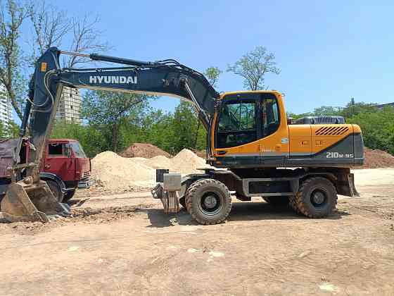 Полноповоротный колесный экскаватор Донецк