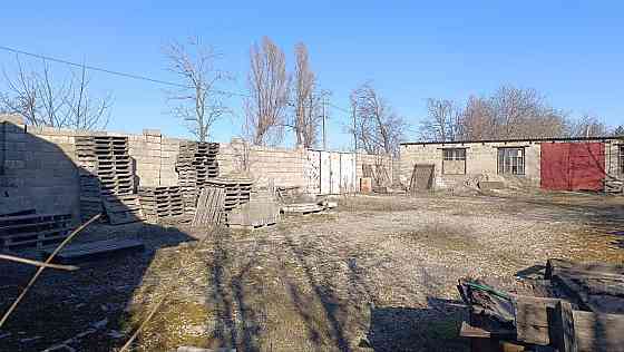 Продажа приватизированного земельного участка с домом и производственными помещениями Мариуполь