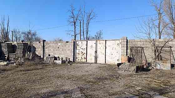 Продажа приватизированного земельного участка с домом и производственными помещениями Мариуполь