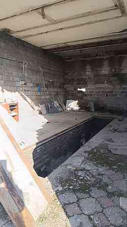 Продажа приватизированного земельного участка с домом и производственными помещениями Мариуполь