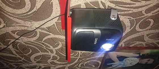 Проектор Umiio Q2 2/64 Гб+экран+штатив+бт колонка(акб)+бт джойстик(б/у 3 месяца) Макеевка