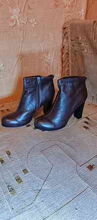 Продаю новые ботильоны (полусапожки) на каблуке, натуральная кожа, коричневые Донецк