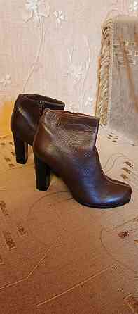 Продаю новые ботильоны (полусапожки) на каблуке, натуральная кожа, коричневые Донецк