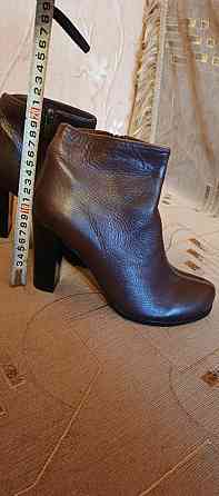 Продаю новые ботильоны (полусапожки) на каблуке, натуральная кожа, коричневые Донецк