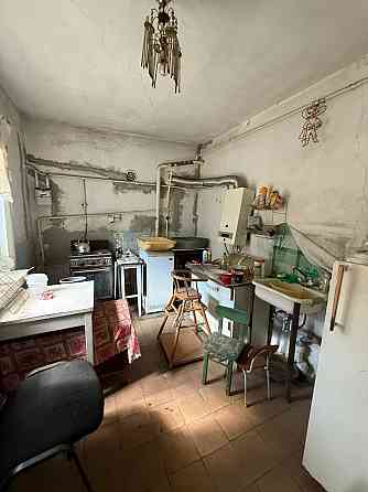 Продажа отдельно стоящего дома - Земля приватизирована - Киевский район Донецка ул Донецк