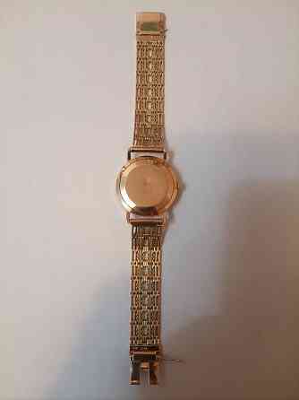 Золотые часы " полёт" на золотом браслете Донецк