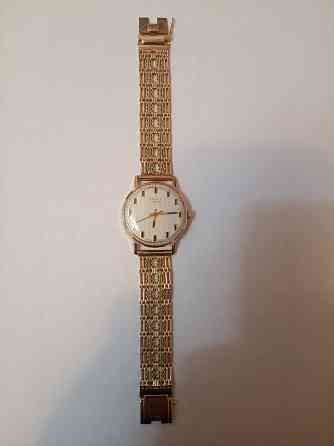 Золотые часы " полёт" на золотом браслете Донецк