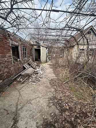 дом ул.островского Мариуполь