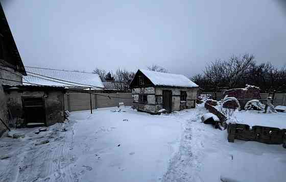 Продам 2 дома фактически на одном участке (84 м2 и 77 м2) в районе Жд вокзала Донецк