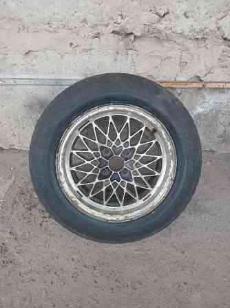 Продаю запаску р 15,разболтовка 4 на 100,оригинальная с бмв Донецк