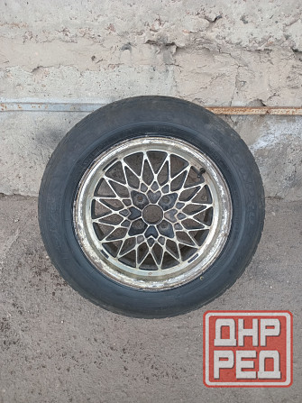 Продаю запаску р 15,разболтовка 4 на 100,оригинальная с бмв Донецк - изображение 1