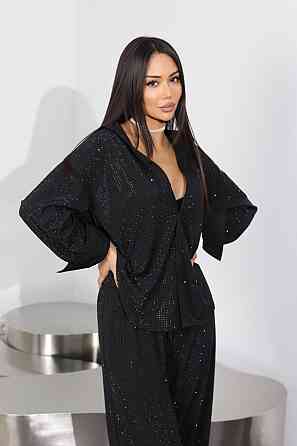 Очень красивый эффектный брючный костюм р.L Донецк