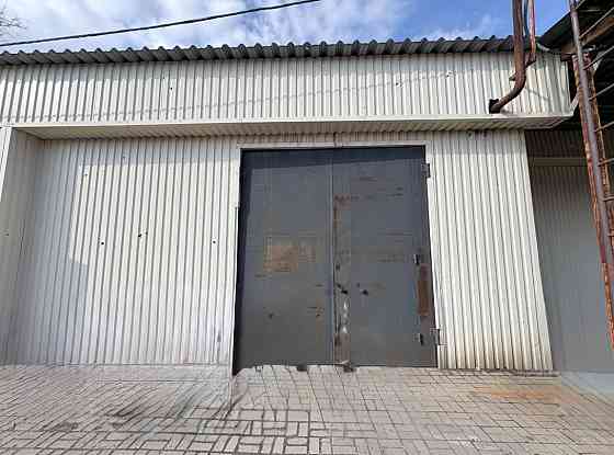 Аренда Гаражный бокс 90 м² с ямой. Участок под стоянку. м-н "Октябрьский" Донецк