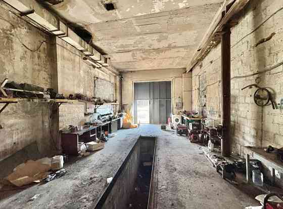 Аренда Гаражный бокс 90 м² с ямой. Участок под стоянку. м-н "Октябрьский" Донецк