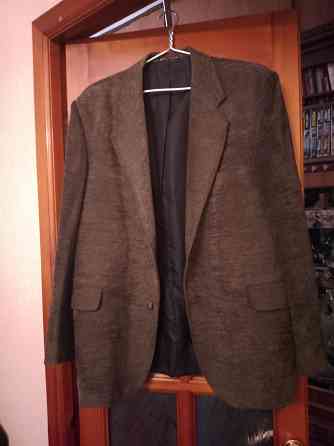 Несколько пакетов мужской верхней одежды Макеевка