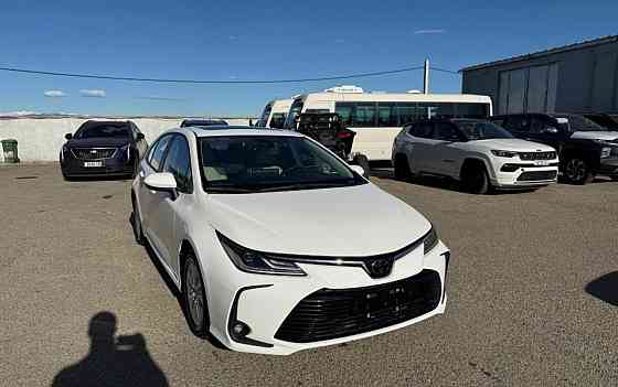 Тойота Королла год 2022 Цвет кузова белый жемчуг бензин 1,8 передний привод Донецк