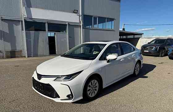 Тойота Королла год 2022 Цвет кузова белый жемчуг бензин 1,8 передний привод Донецк