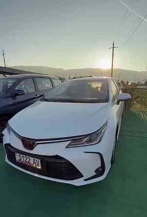 Тойота Королла год 2022 Цвет кузова белый жемчуг бензин 1,8 передний привод Донецк