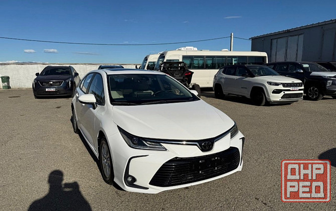 Тойота Королла год 2022 Цвет кузова белый жемчуг бензин 1,8 передний привод Донецк - изображение 3