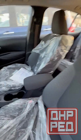 Тойота Королла год 2022 Цвет кузова белый жемчуг бензин 1,8 передний привод Донецк - изображение 5