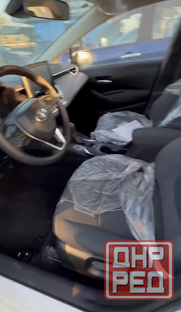 Тойота Королла год 2022 Цвет кузова белый жемчуг бензин 1,8 передний привод Донецк - изображение 8