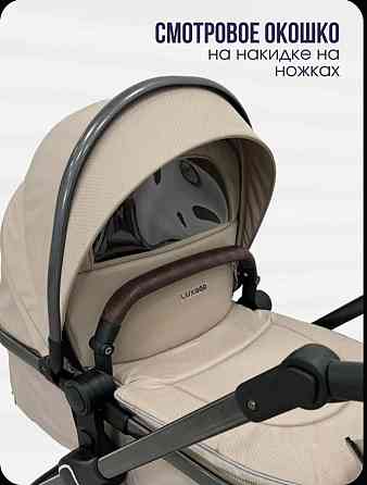 Коляска Luxmom для новорожденных с автолюлькой 3 в 1 Донецк