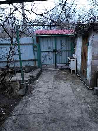 Продам дом 100 м2 с кап ремонтом Текстильщик рядом, граница Кировского и Петровского районах,гараж,8 Донецк