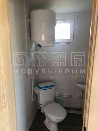 Бежевый дачный домик с террасой. Донецк