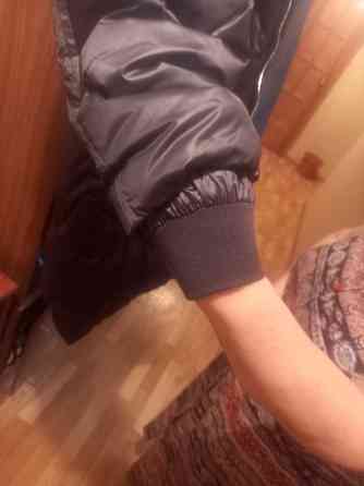 Пальто зимнее фирменное с капюшоном новое,р-р52-54,длина по-колено на средний рост Донецк