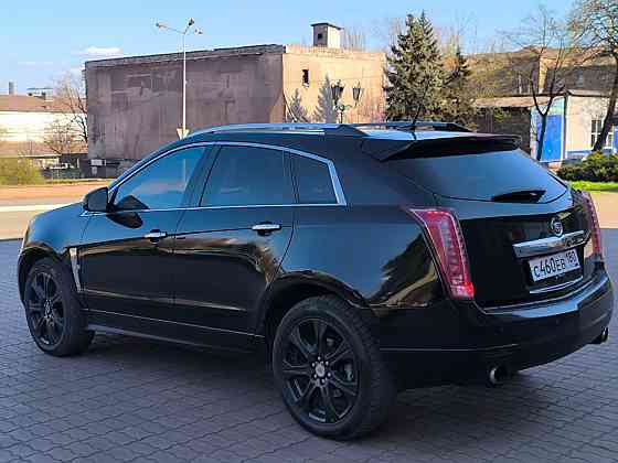 Продам очень красивый автомобиль , самый надёжный и недорогой в обслуживании Cadillac SRX 2012 года Енакиево