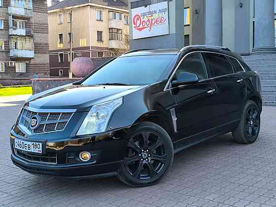 Продам очень красивый автомобиль , самый надёжный и недорогой в обслуживании Cadillac SRX 2012 года Енакиево
