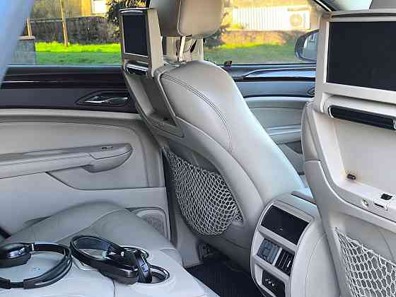 Продам очень красивый автомобиль , самый надёжный и недорогой в обслуживании Cadillac SRX 2012 года Енакиево