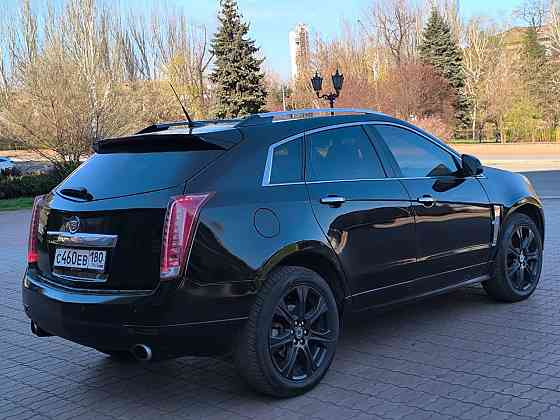 Продам очень красивый автомобиль , самый надёжный и недорогой в обслуживании Cadillac SRX 2012 года Енакиево
