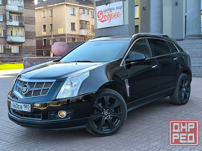Продам очень красивый автомобиль , самый надёжный и недорогой в обслуживании Cadillac SRX 2012 года Енакиево - изображение 1