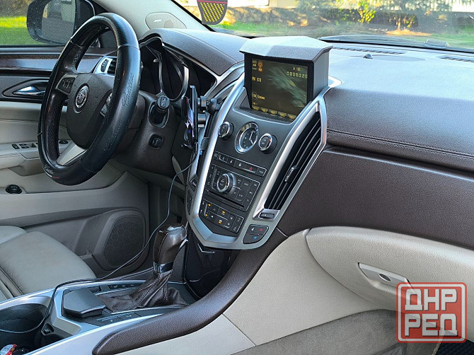 Продам очень красивый автомобиль , самый надёжный и недорогой в обслуживании Cadillac SRX 2012 года Енакиево - изображение 6