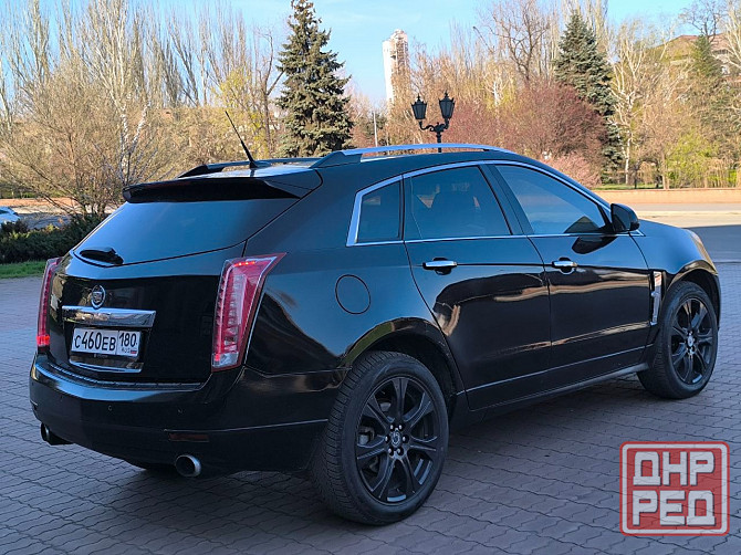 Продам очень красивый автомобиль , самый надёжный и недорогой в обслуживании Cadillac SRX 2012 года Енакиево - изображение 4