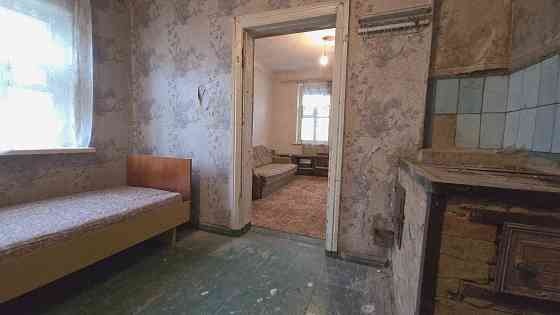 Продам уютный домик с гаражом на хорошем участке земли, правильной формы. Донецк