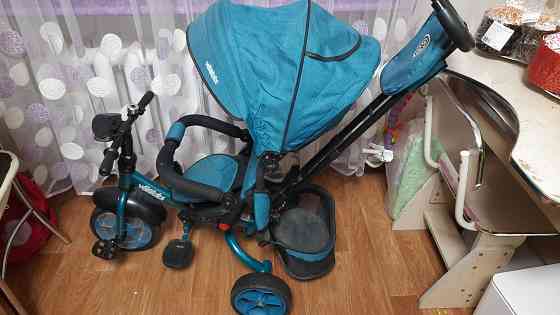 Продам прогулочную коляску и велосипед с род. ручкой Донецк