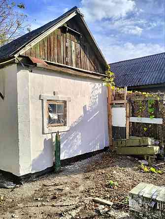 Продаётся с гаражом и землёй большой дом с флигелем в Куйбышевском районе Донецк