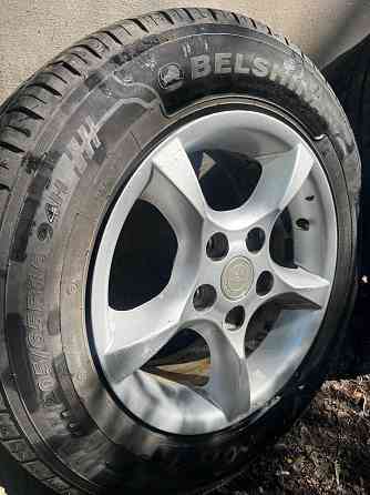 Продам комплект из 4 колес: литые диски R15 с летней резиной Geely Emgrand EC7. Донецк