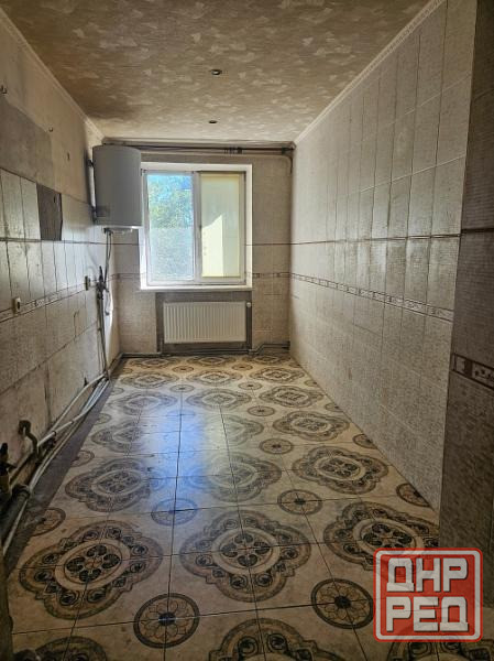 Продам 4 ком кв в Кировском р-н по ул Коммунаров Донецк - изображение 1
