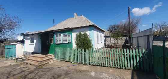 Продам дом и земельный участок Зугрэс