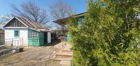 Продам дом и земельный участок Зугрэс