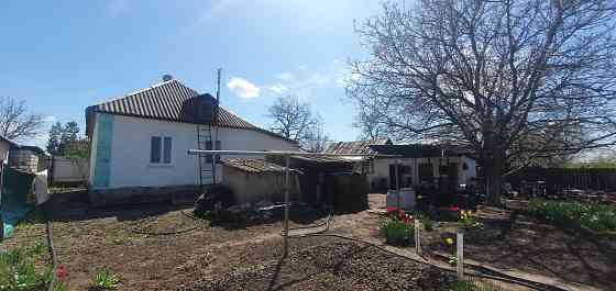 Продам дом и земельный участок Зугрэс
