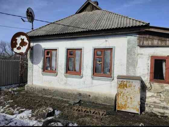 Продается ветхий дом .на Капитальной,с приватизированной землей. Макеевка