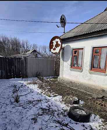 Продается ветхий дом .на Капитальной,с приватизированной землей. Макеевка