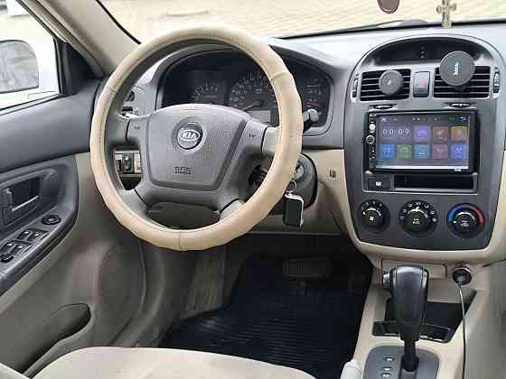 Продам Kia Cerato в идеальном техническом состоянии 2.0 Газ/бензин на автомате ! Енакиево