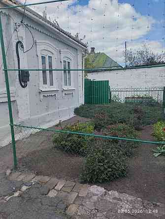 Продаётся 4 -х комнатный кирпичный дом в Ильичевском районе, поселок Мирный. Мариуполь