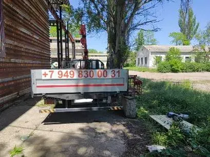 Услуги манипулятора ISUZU, 5 тонн, длина кузова 6 метров. Автовышка (люлька) 13 метров Донецк