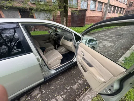 Продам отличный Nissan Tiida C11 (чистый Японец)Покупался с салона 1 владелец (Мать) Донецк